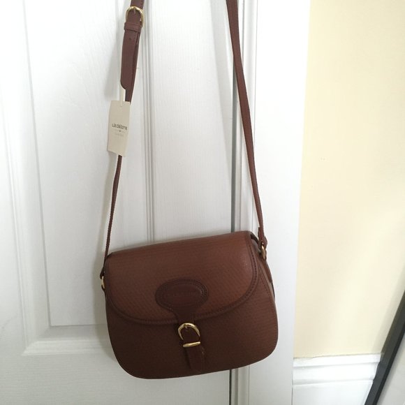 Liz Claiborne Handbags - Liz Claiborne genuine leather crossbody purse